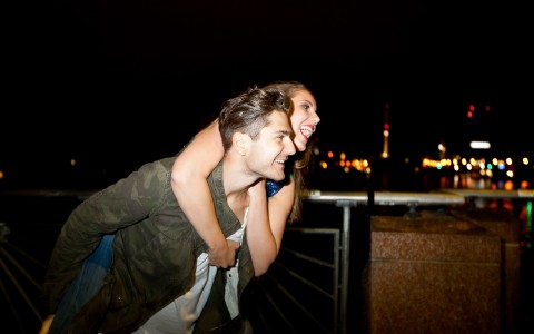 a couple in the city at night