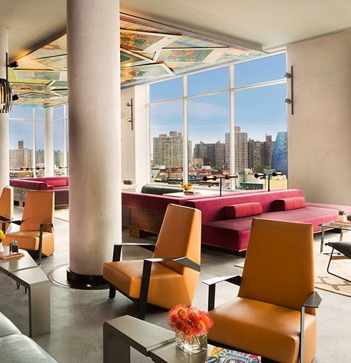 a lounge area with city views